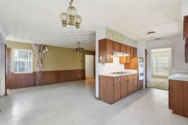 a bathroom with a sink and a window