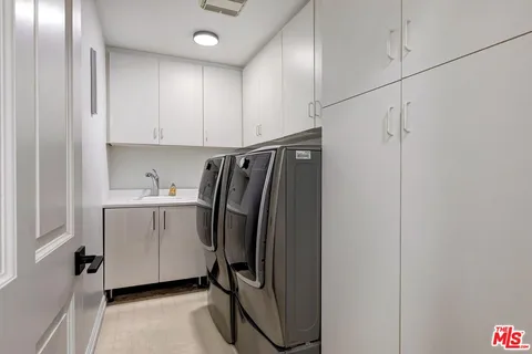 a view of walk in closet with window