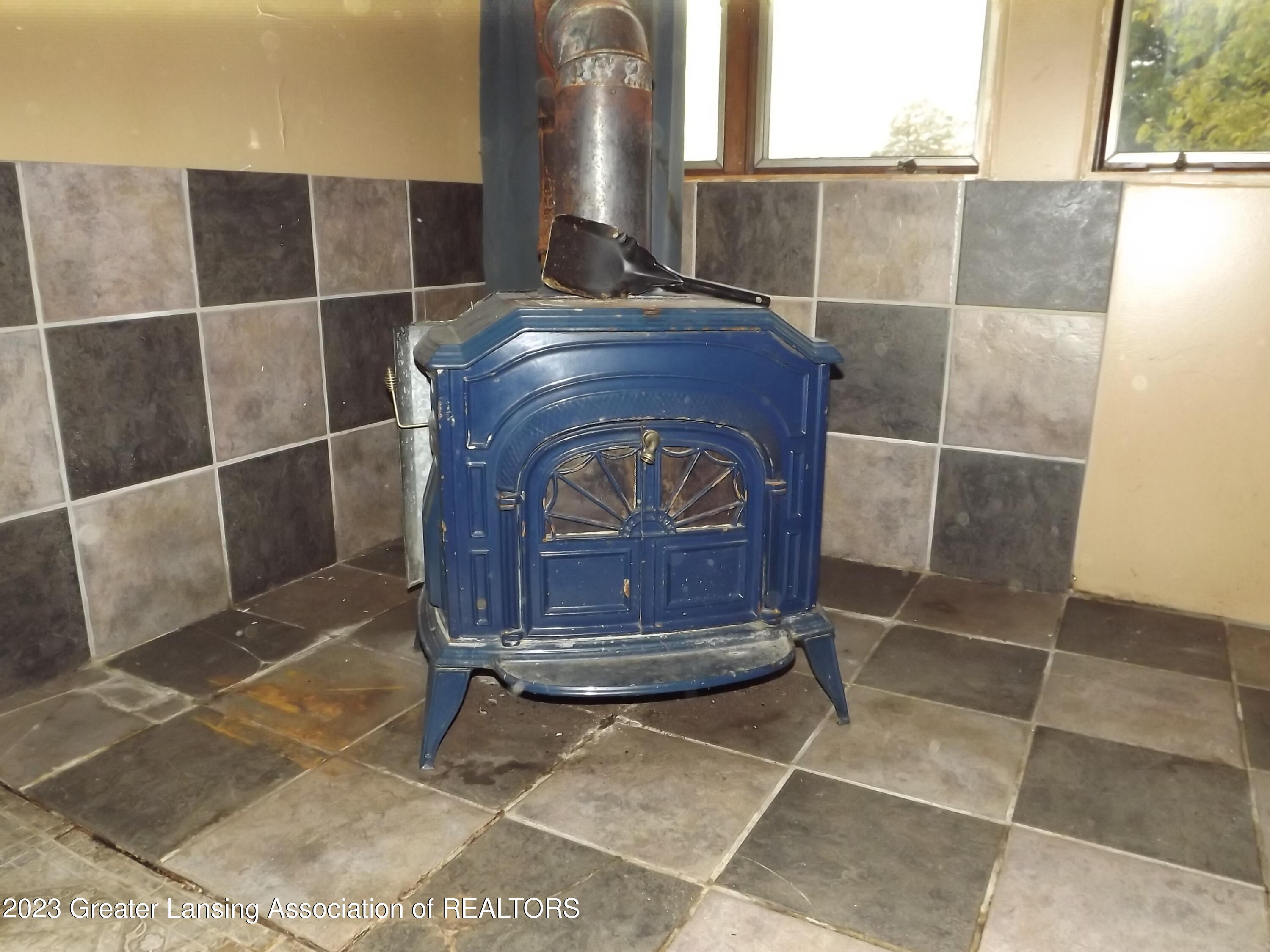 2223 South Ionia Road Bellevue, MI 49021 - Photo 21 of 29 Wood Stove