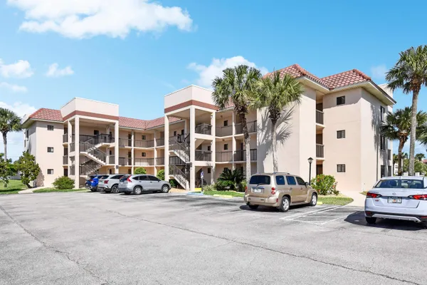 a car parked in front of a building
