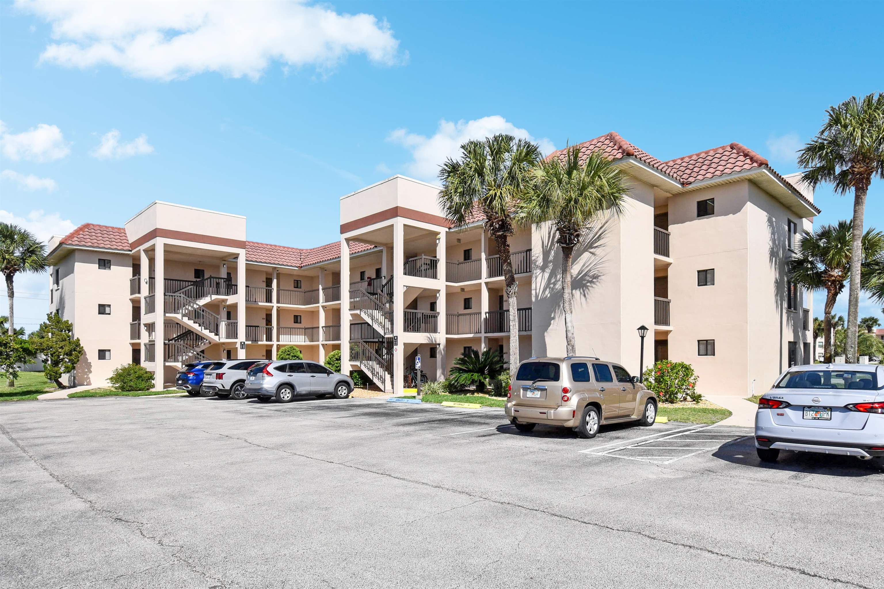 4250 A1A South, Unit M 31 St. Augustine, FL 32080 - Photo 13 of 21 a car parked in front of a building