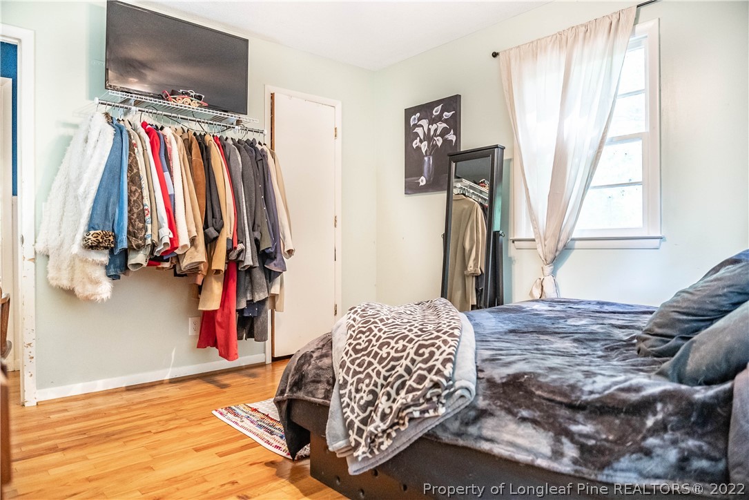 4064 Vass-Carthage Road Carthage, NC 28327 - Photo 26 of 50 a view of walk in closet with clothes and shoes