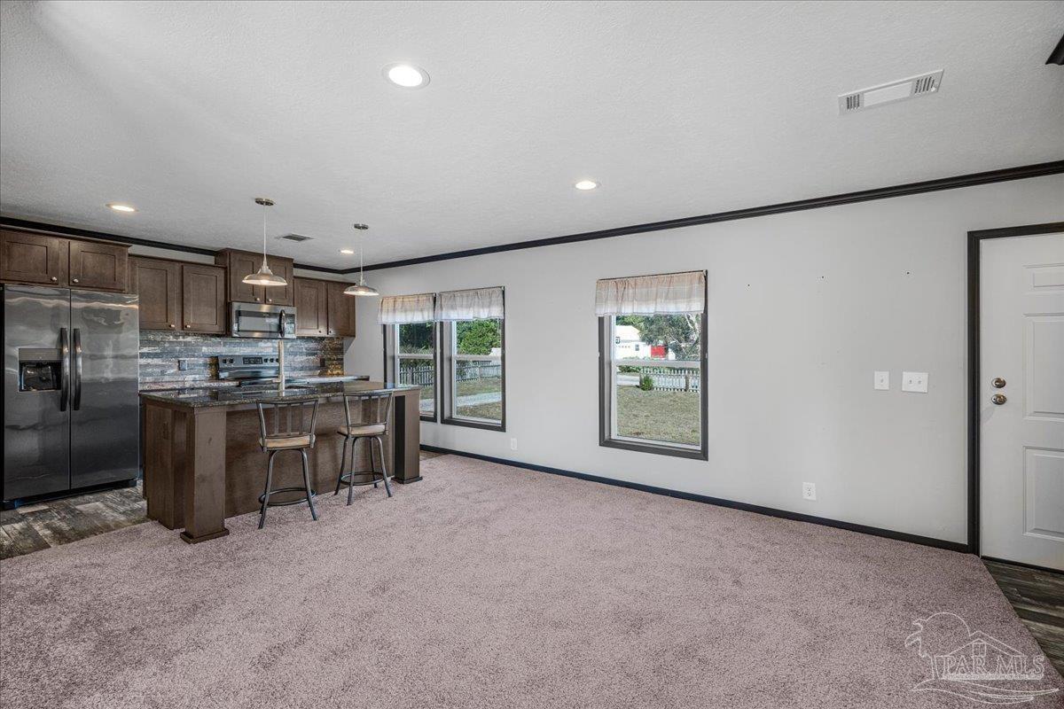 7789 Trinity Baptist Church Road Milton, FL 32570 - Photo 11 of 39 a view of kitchen with furniture and window