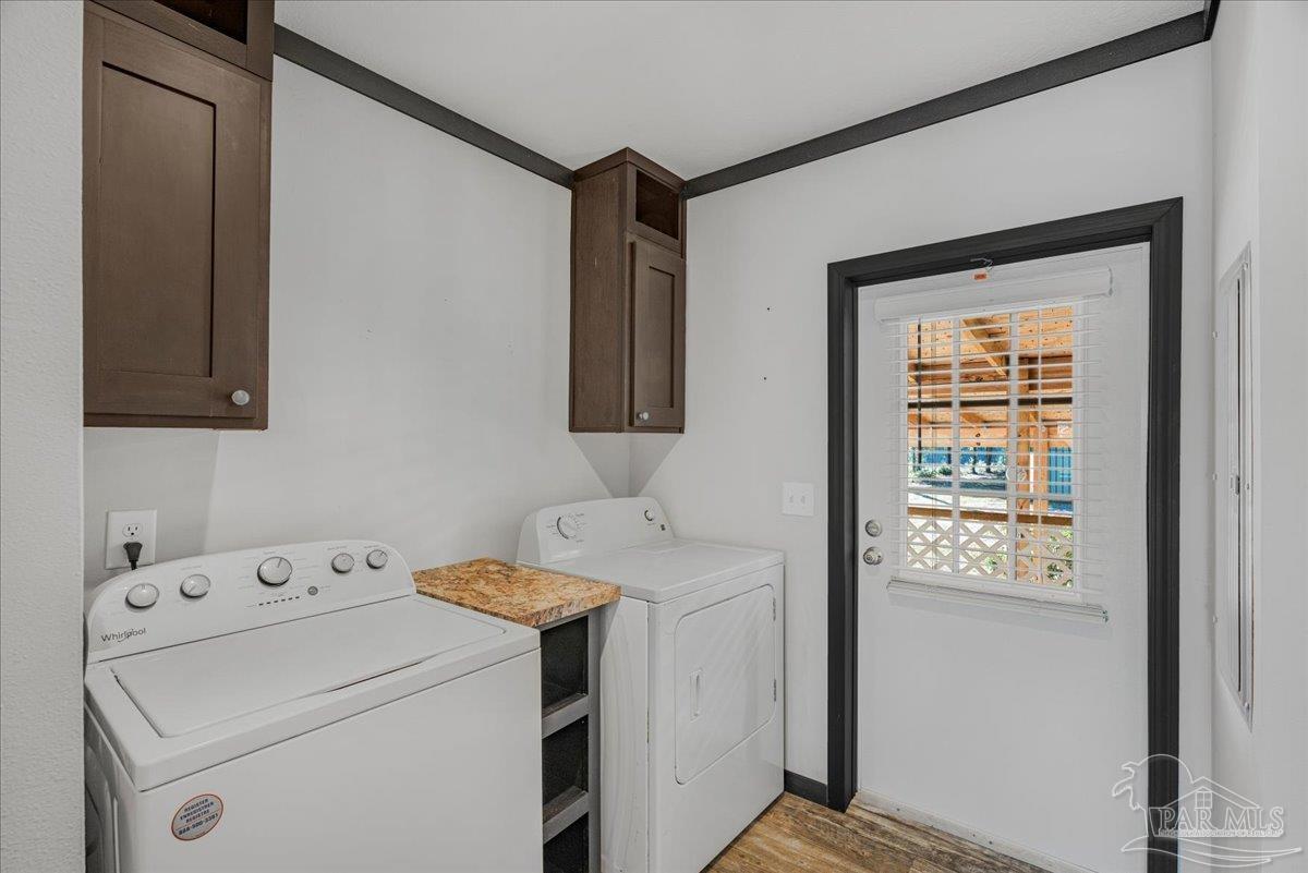 7789 Trinity Baptist Church Road Milton, FL 32570 - Photo 26 of 39 a utility room with dryer and washer