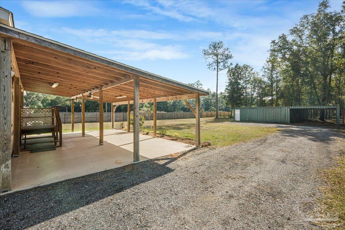 7789 Trinity Baptist Church Road Milton, FL 32570 - Photo 33 of 39 a view of a backyard