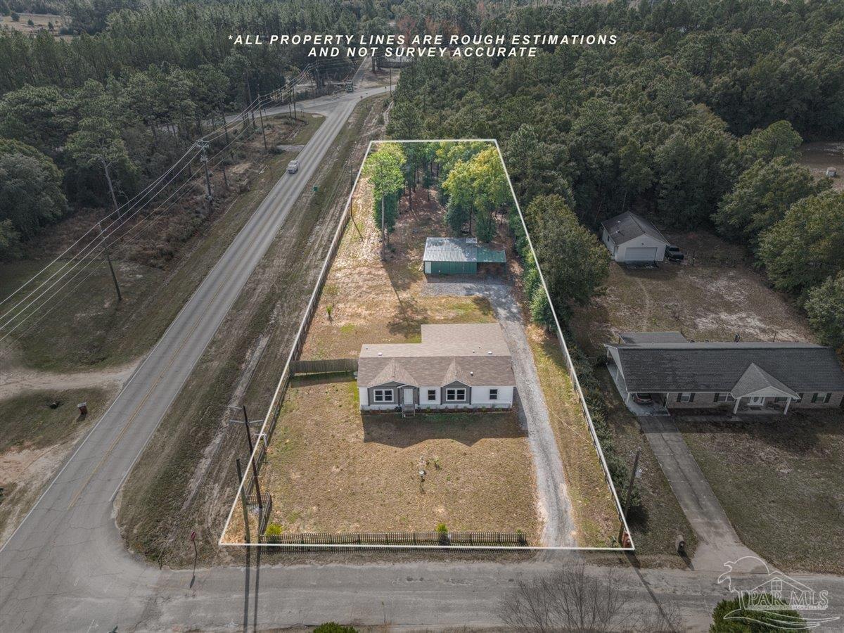 7789 Trinity Baptist Church Road Milton, FL 32570 - Photo 5 of 39 a view of a fireplace