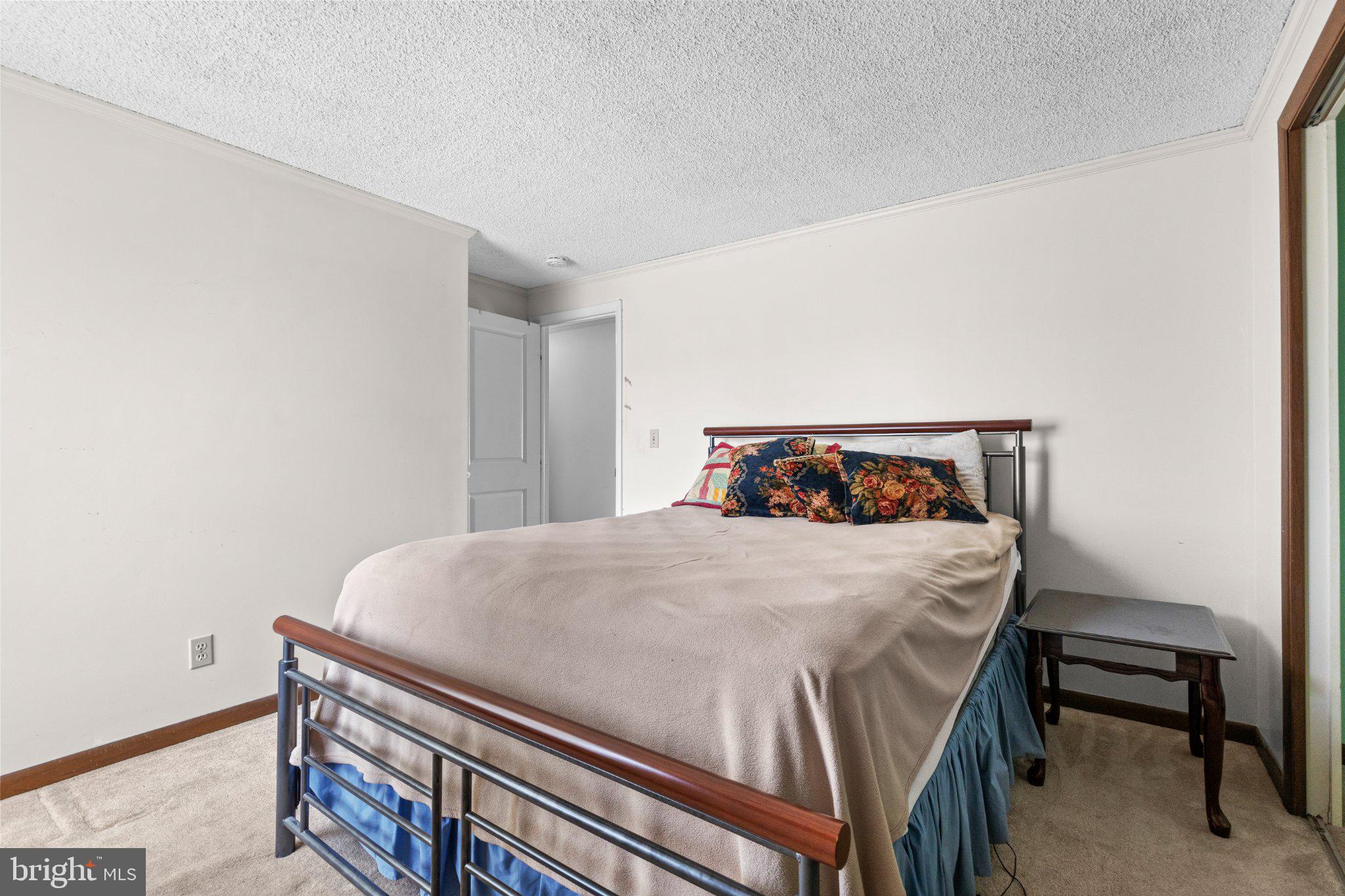 430 Fairview Road Manheim, PA 17545 - Photo 13 of 32 a bedroom with a bed and a table in it