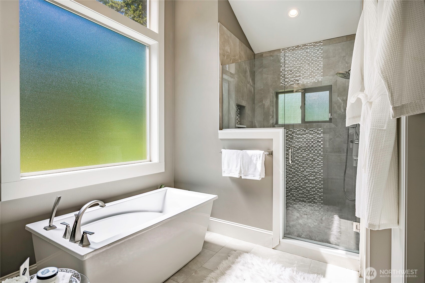 9125 Shearwater Road Blaine, WA 98230 - Photo 23 of 40 a bathroom with a tub and a window