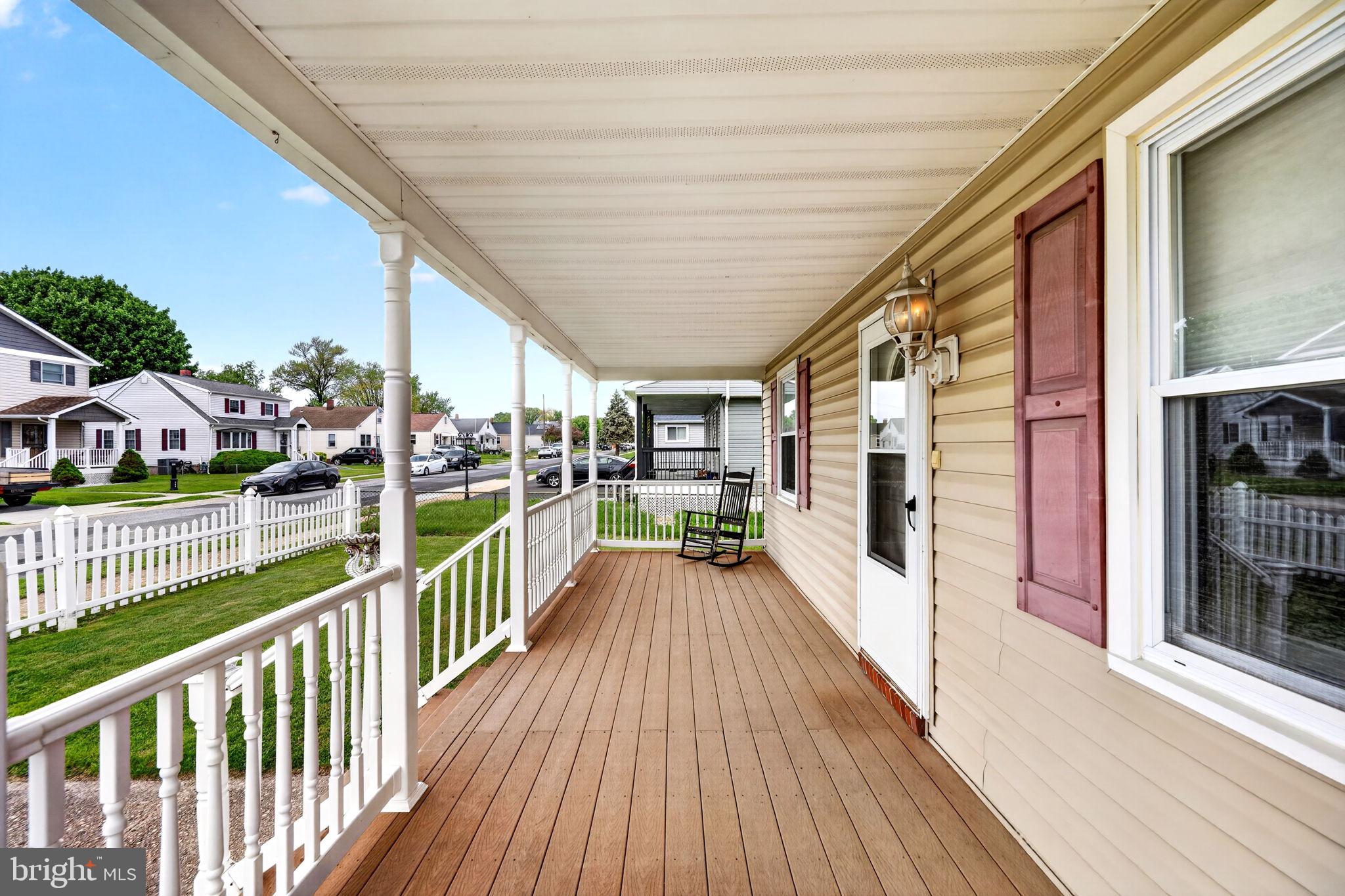 206 South Woodwell Road Baltimore, MD 21222 - Photo 2 of 46 a view of a balcony with wooden floor