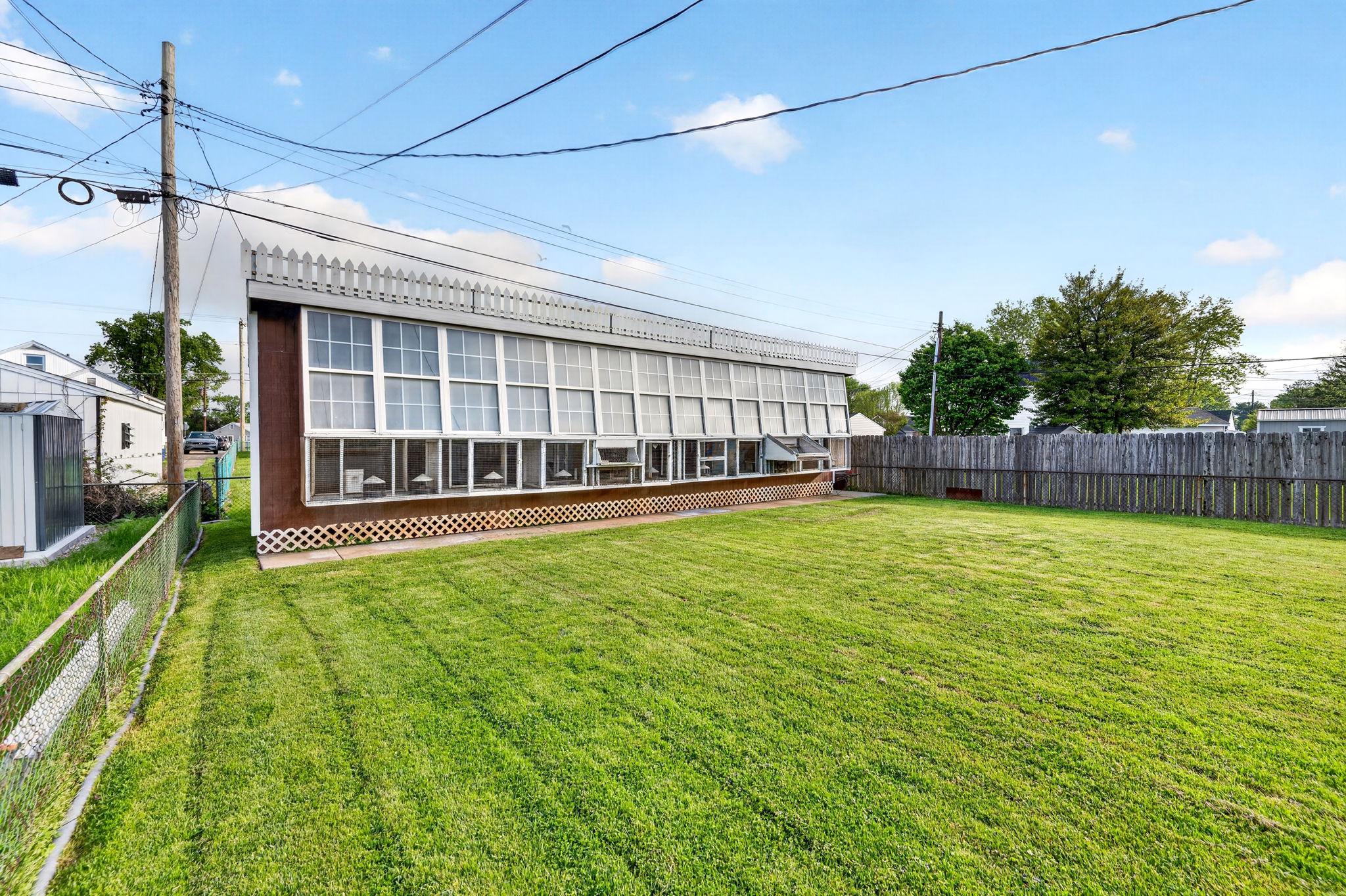 206 South Woodwell Road Baltimore, MD 21222 - Photo 32 of 46 a view of a house with a backyard