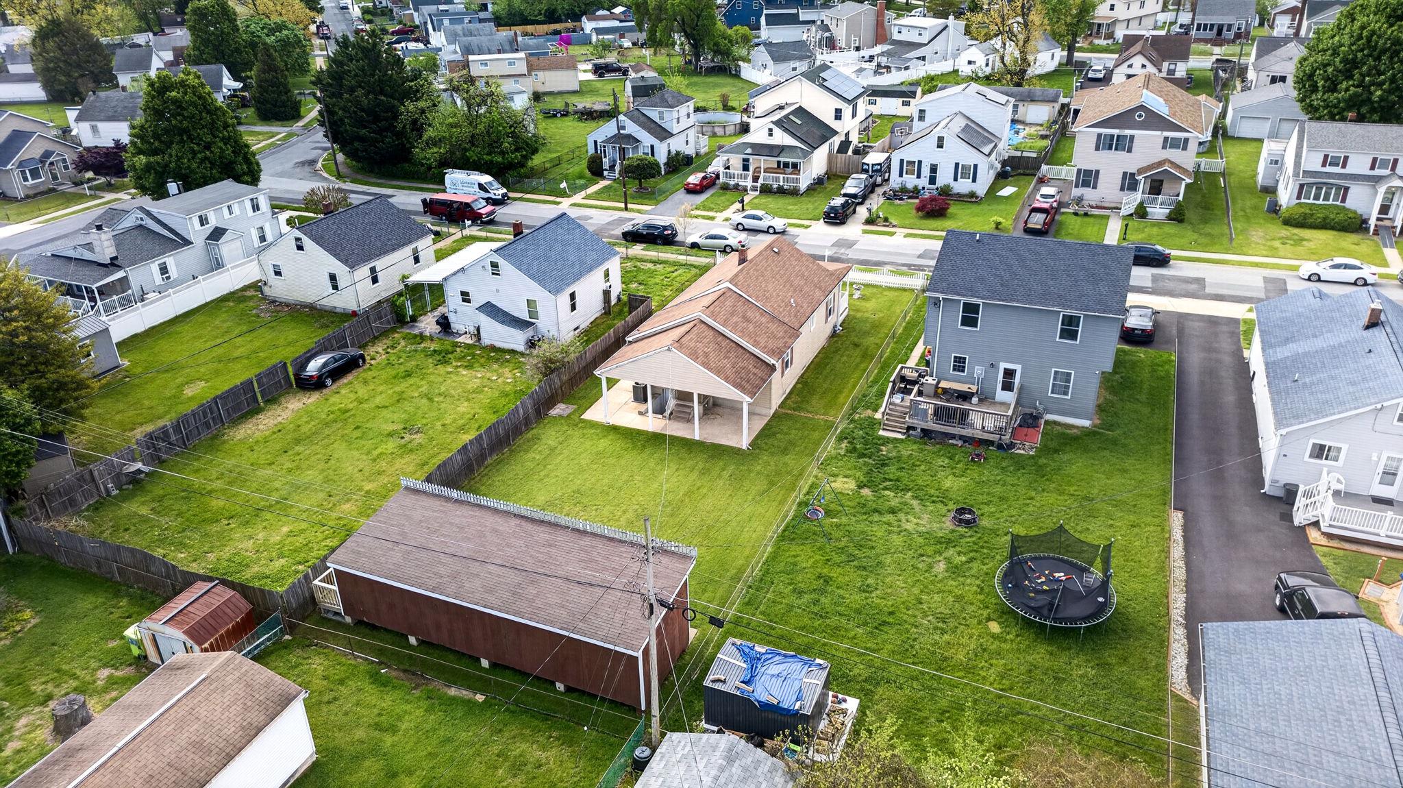 206 South Woodwell Road Baltimore, MD 21222 - Photo 38 of 46 an aerial view of a house with garden space and street view