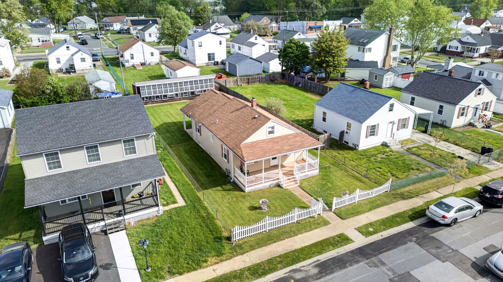 206 South Woodwell Road Baltimore, MD 21222 - Photo 41 of 46 an aerial view of a house with a garden and houses