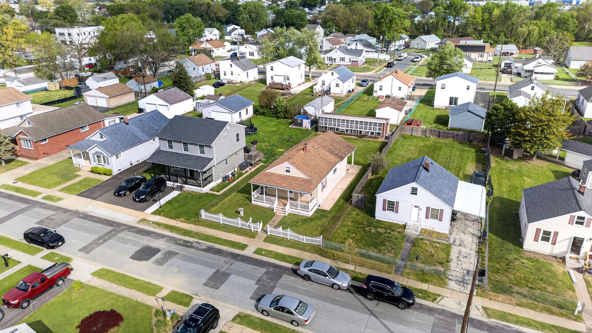 206 South Woodwell Road Baltimore, MD 21222 - Photo 42 of 46 an aerial view of residential houses with outdoor space