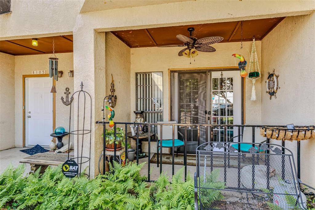 1933 Island Circle, Unit B106 Tool, TX 75143 - Photo 3 of 12 a view of a porch with chairs and backyard