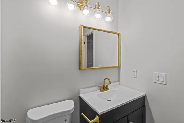 a view of storage and utility room with racks on the wall