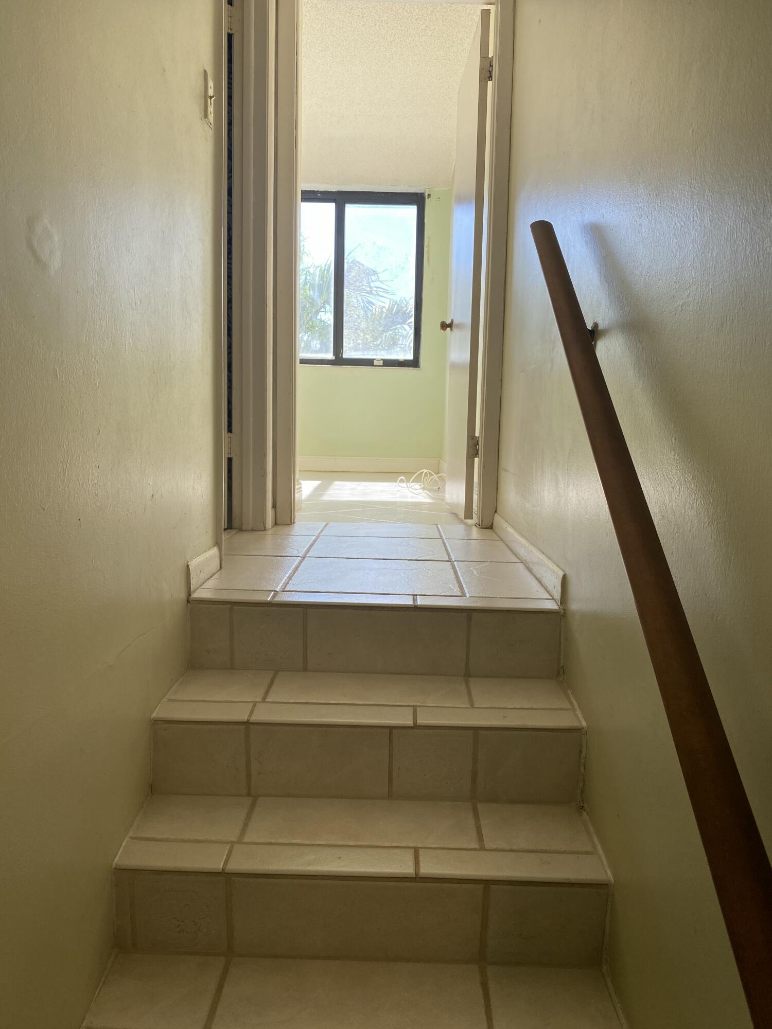 755 Dotterel Road, Unit 1304 Delray Beach, FL 33444 - Photo 15 of 21 Stairs to 2nd bedroom