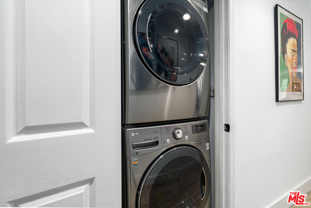 11740 Sunset Boulevard, Unit 14 Los Angeles, CA 90049 - Photo 28 of 44 a close view of utility room with washer and dryer