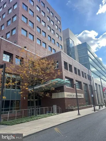 a view of a building with a street