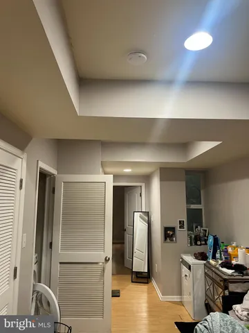 a kitchen with stainless steel appliances granite countertop a refrigerator and a stove