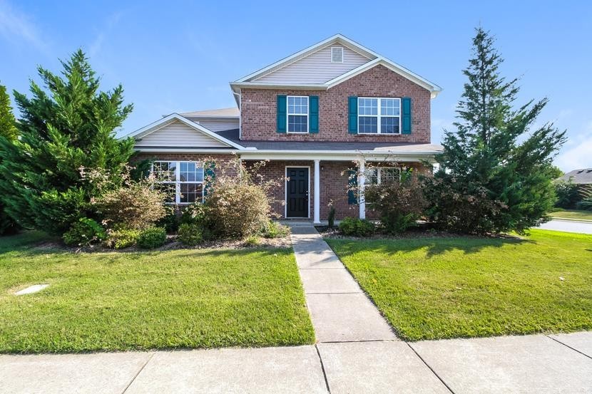 3704 Blaze Drive Murfreesboro, TN 37128 - Photo 1 of 17 a front view of a house with yard and green space