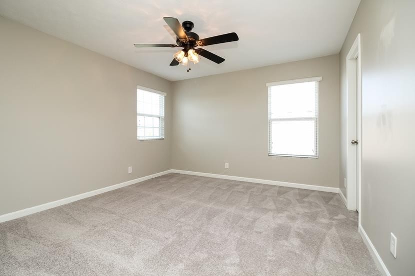 3704 Blaze Drive Murfreesboro, TN 37128 - Photo 10 of 17 an empty room with windows and fan