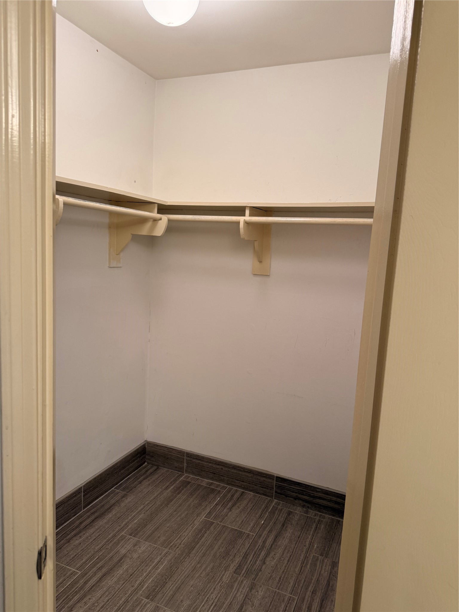 13726 Rampchester Lane Houston, TX 77015 - Photo 13 of 15 a view of an empty walk in closet