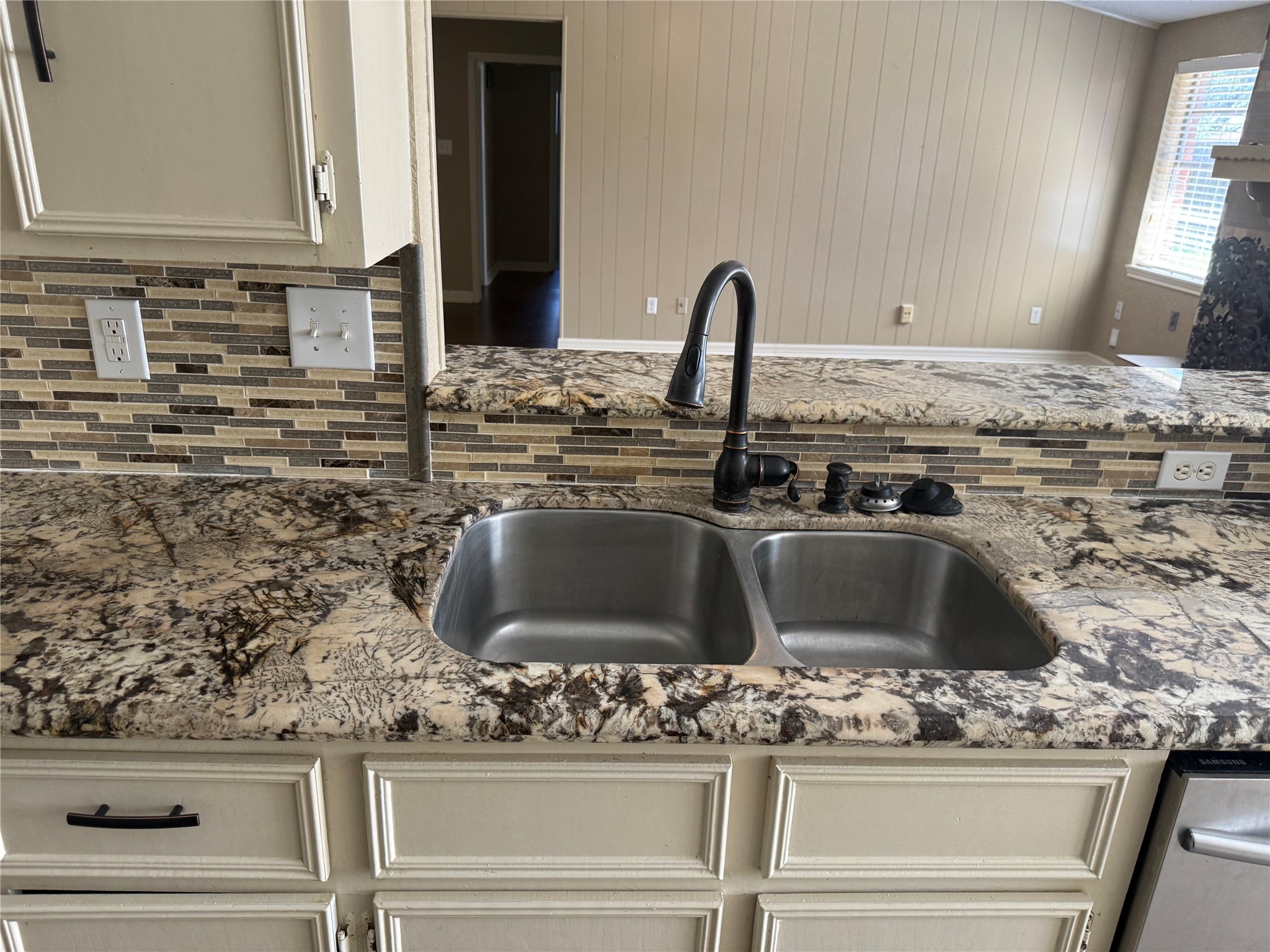 13726 Rampchester Lane Houston, TX 77015 - Photo 18 of 30 a kitchen with a sink and a stove