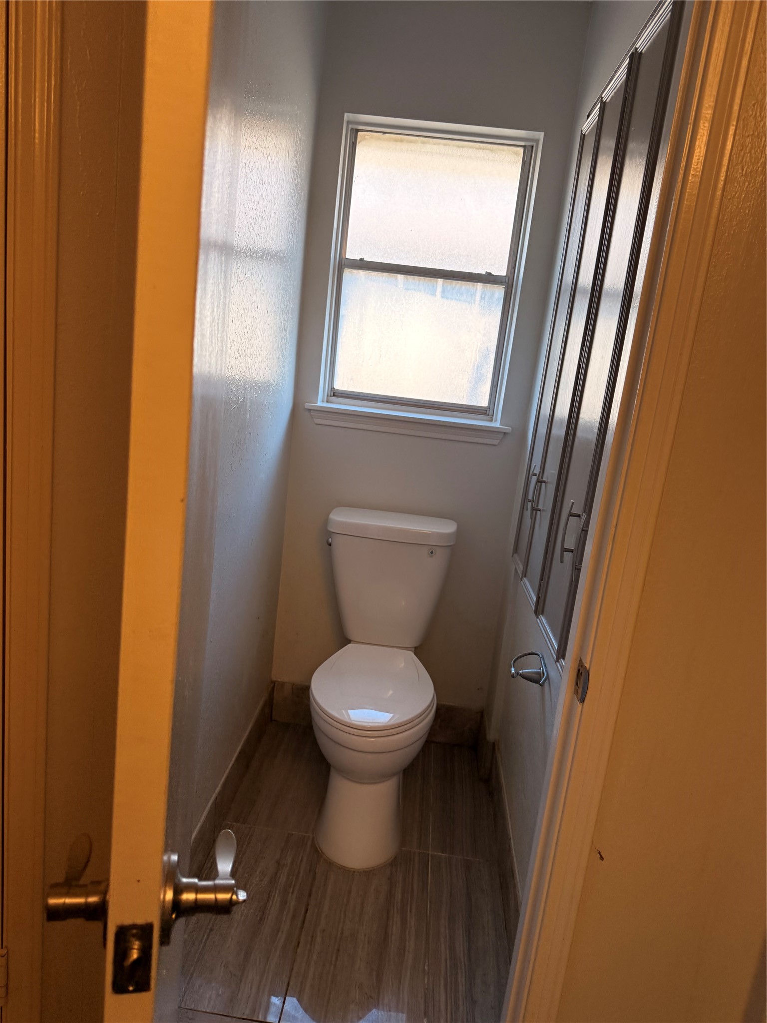 13726 Rampchester Lane Houston, TX 77015 - Photo 23 of 30 a bathroom with a toilet and a sink