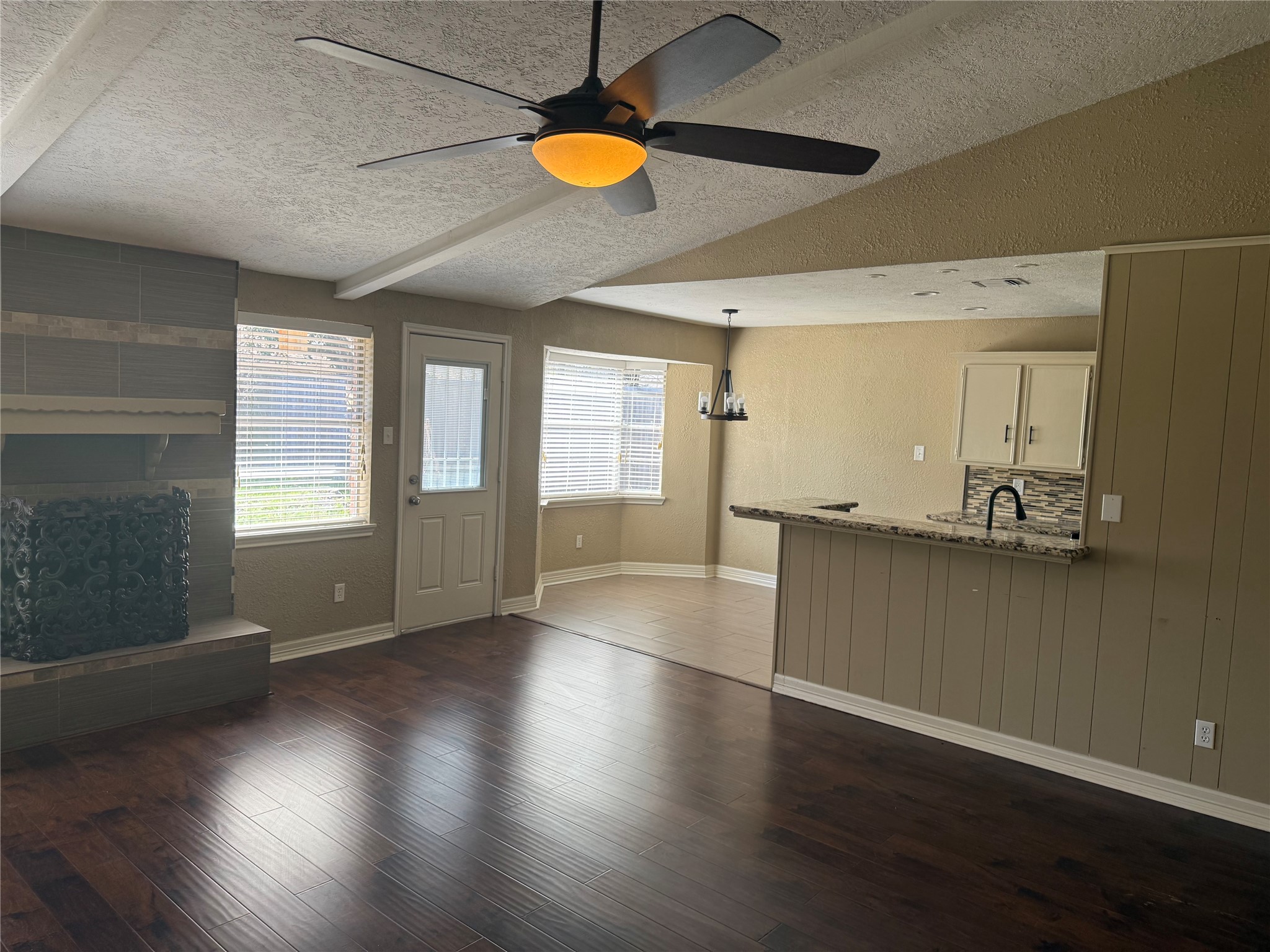 13726 Rampchester Lane Houston, TX 77015 - Photo 5 of 30 a view of an empty room with window and wooden floor