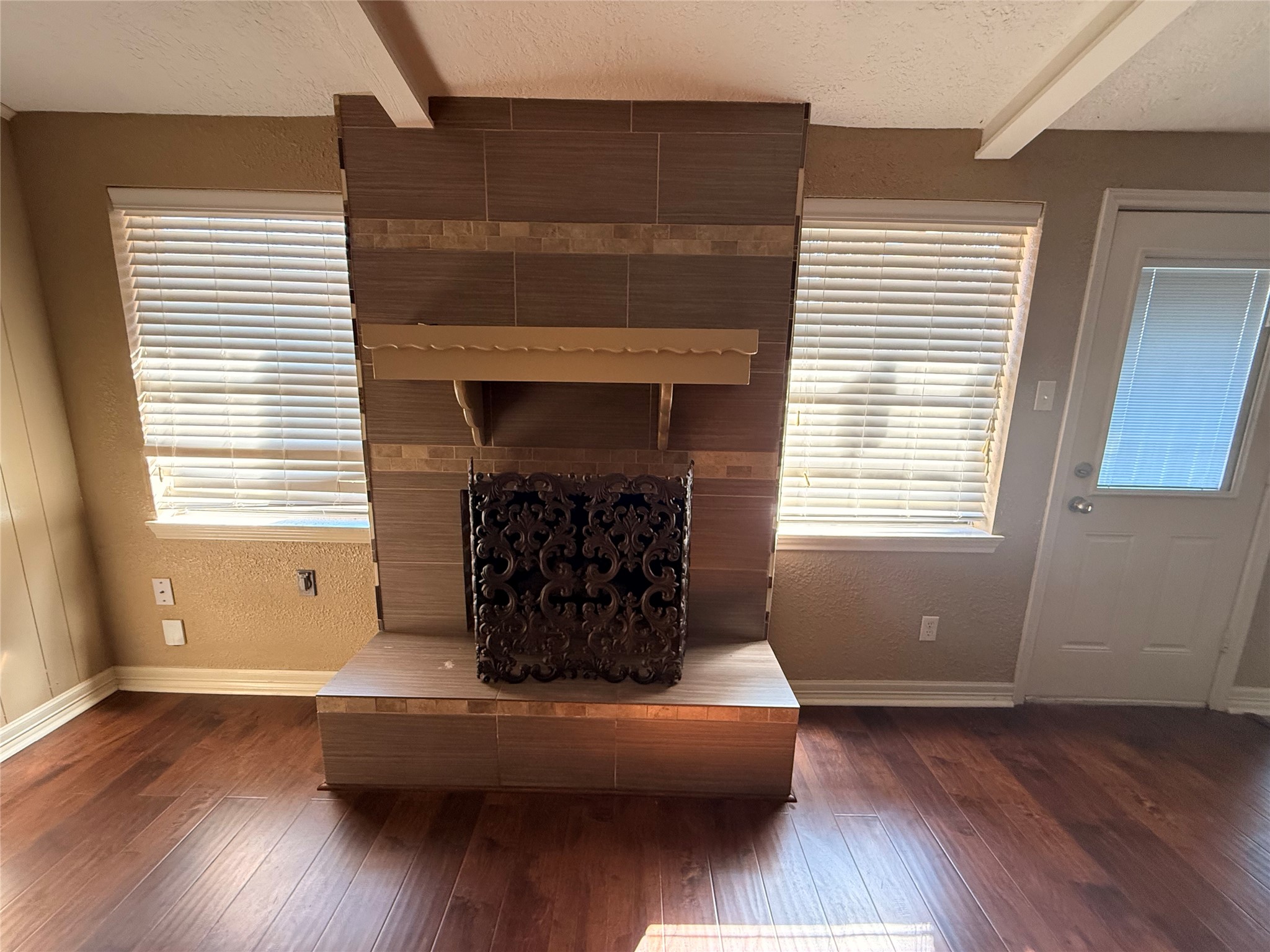 13726 Rampchester Lane Houston, TX 77015 - Photo 6 of 15 a living room with furniture and a fireplace