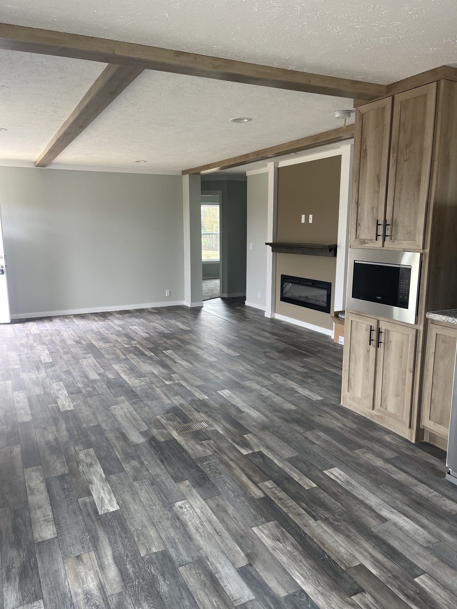 889 White Springs Road Lafayette, TN 37083 - Photo 3 of 9 a view of a kitchen with wooden floor