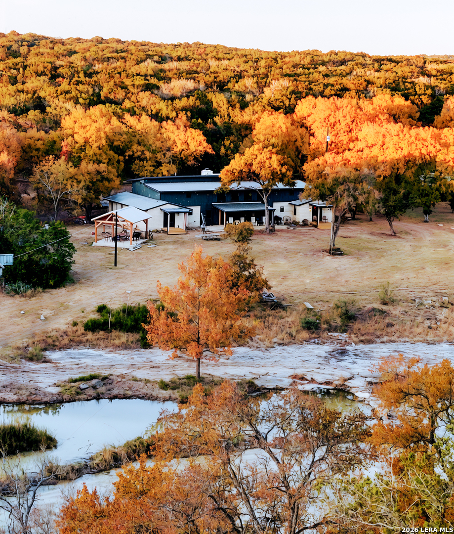 196 Rock Bottom Road Hunt, TX 78024 - Photo 2 of 44 a view of a lake with houses