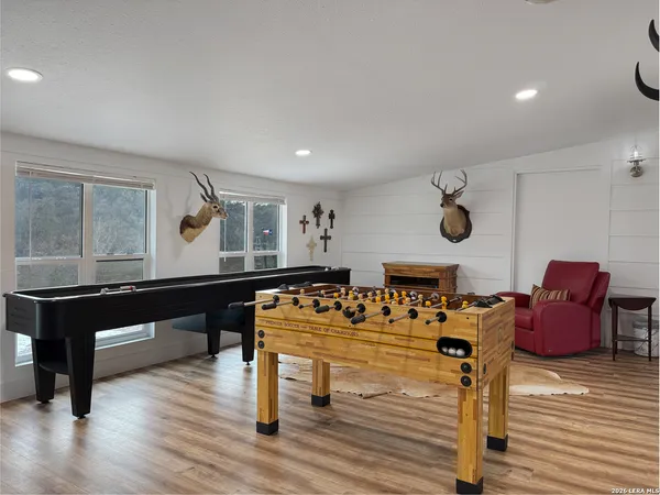 a living room with furniture and a gate