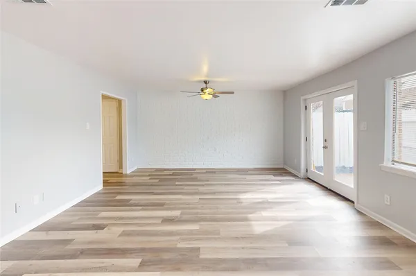 a view of an empty room and window