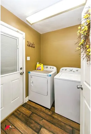 a utility room with dryer and washer