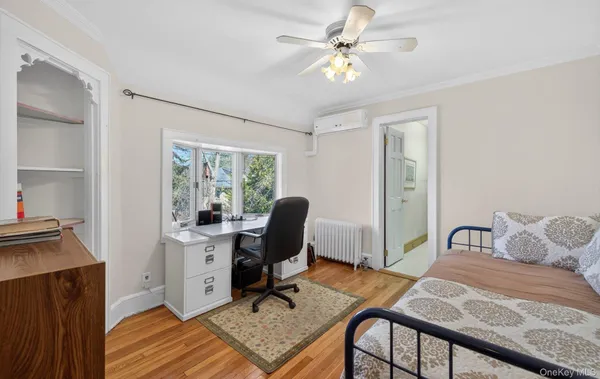 a workspace with furniture and a window