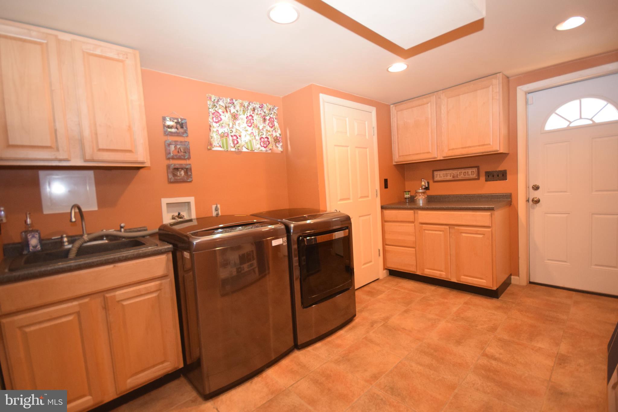 375 Gleaves Road Springfield, PA 19064 - Photo 17 of 38 Huge Laundry Room exits to covered Patio/Car port