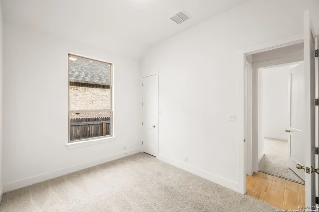 an empty room with a window