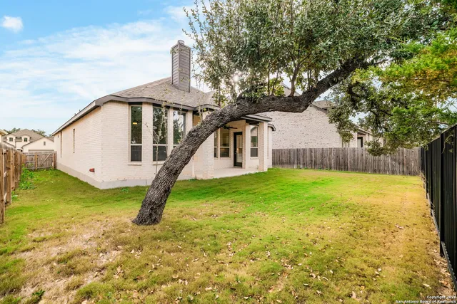 a front view of house with garden