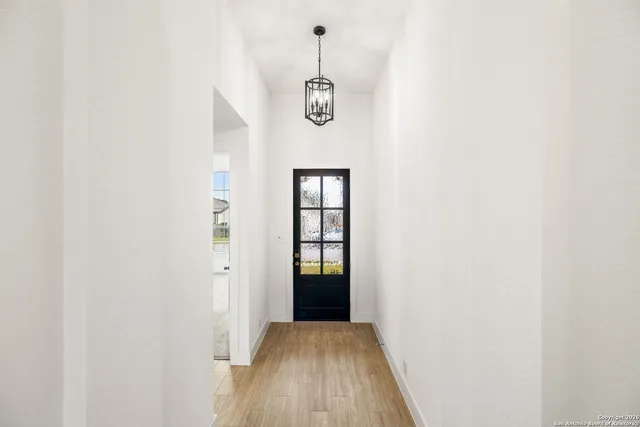a picture of wooden floor in a hall