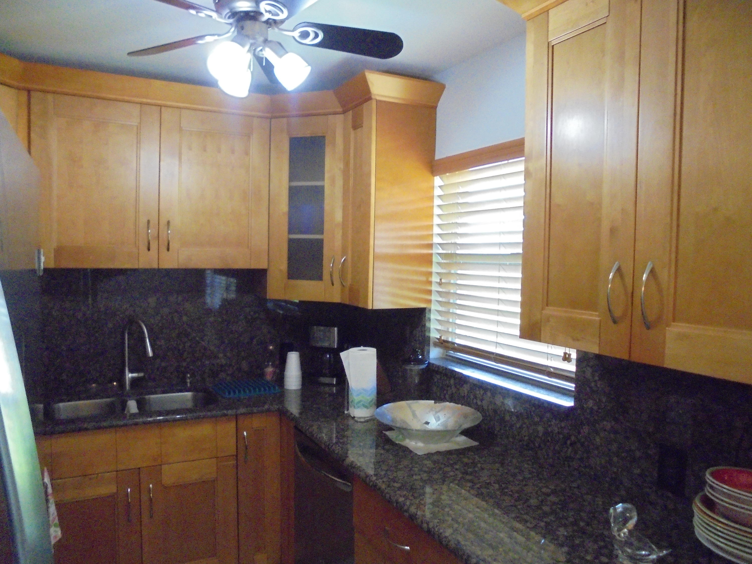 14 Brighton A Boca Raton, FL 33434 - Photo 3 of 15 a kitchen with sink and window