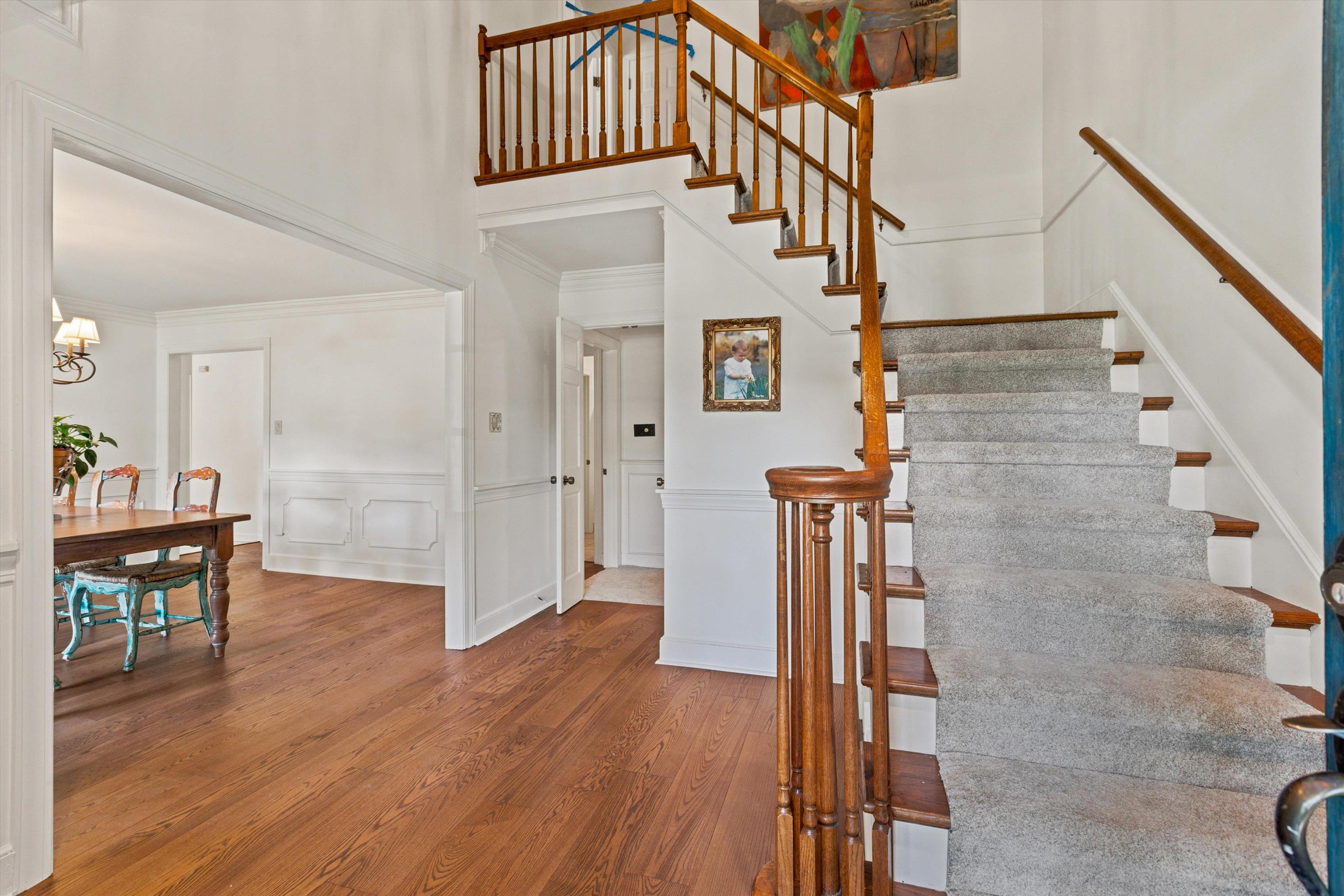 1863 Miller Farms Road Germantown, TN 38138 - Photo 7 of 32 2 story entry with new hardwood floors, new carpet on stairs, smooth ceilings, newly painted interior