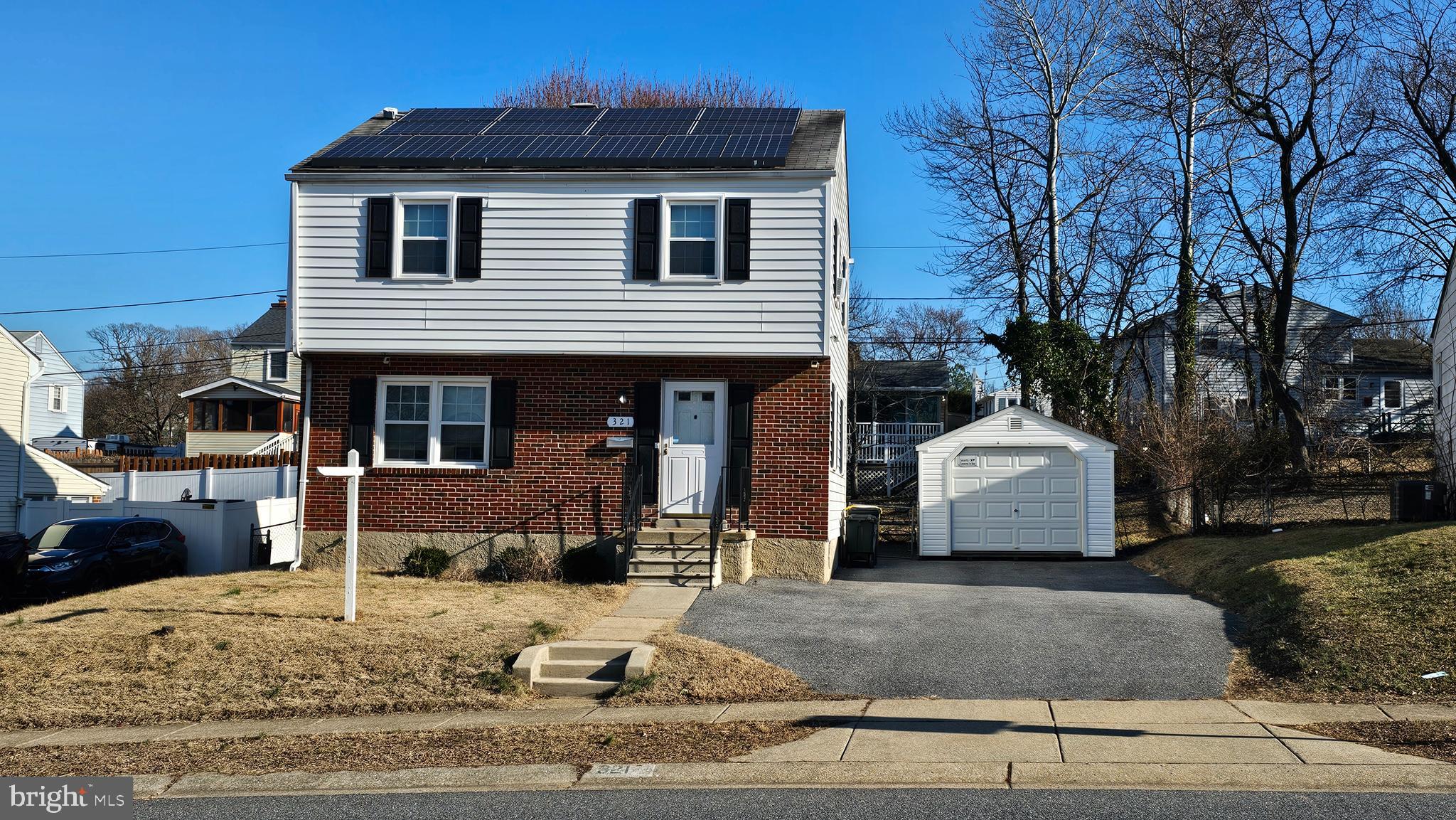 321 Ardmore Road Linthicum Heights, MD 21090 - Photo 1 of 24 a view of a house with a yard