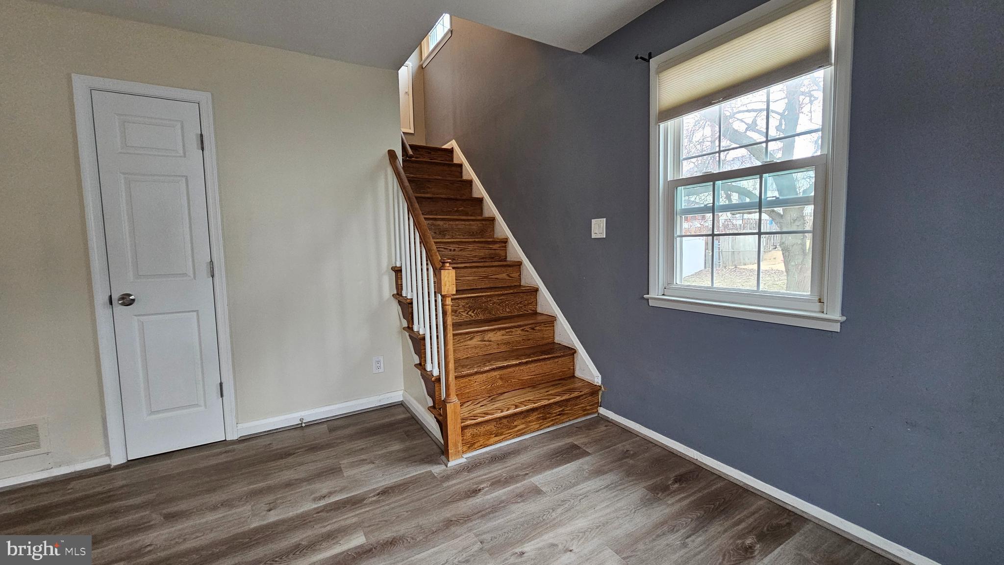 321 Ardmore Road Linthicum Heights, MD 21090 - Photo 13 of 24 wooden floor in an empty room with a window