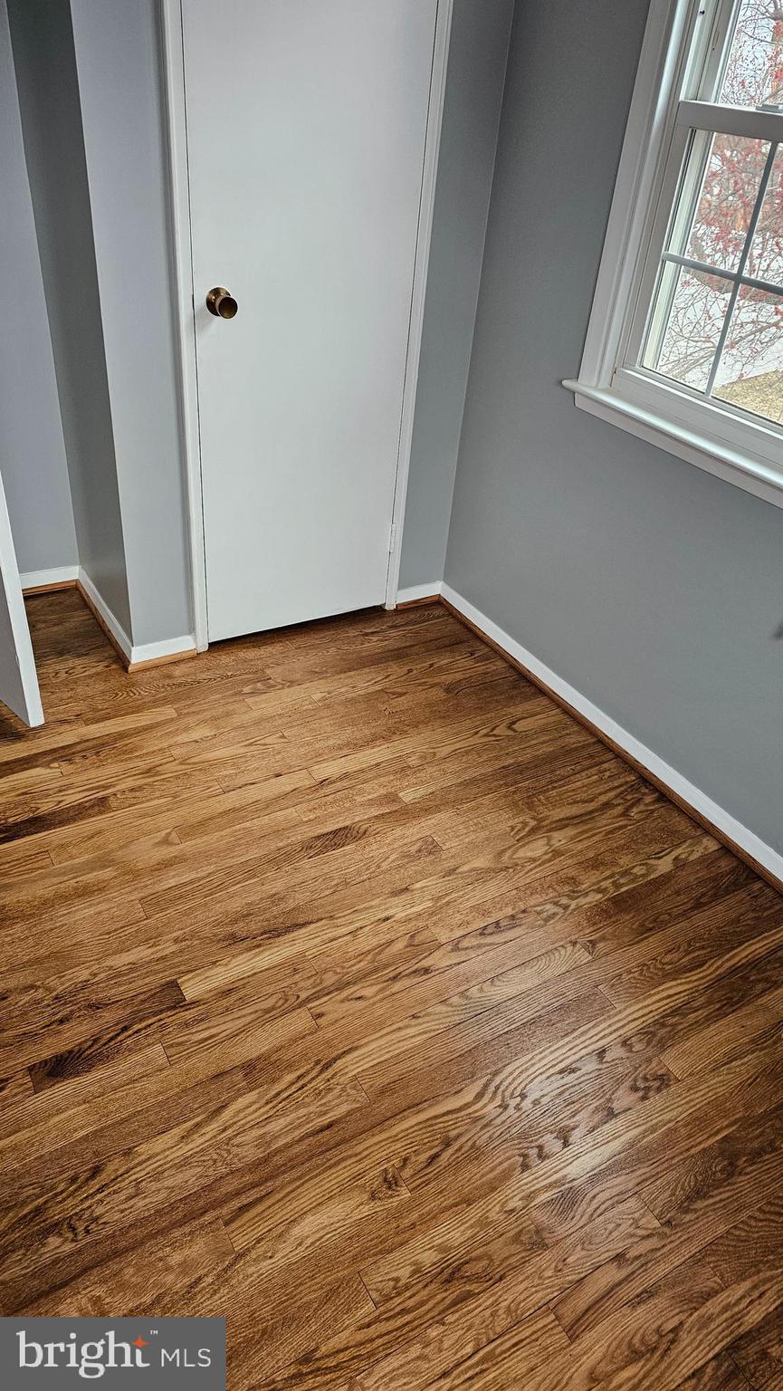 321 Ardmore Road Linthicum Heights, MD 21090 - Photo 16 of 24 a view of empty room with wooden floor