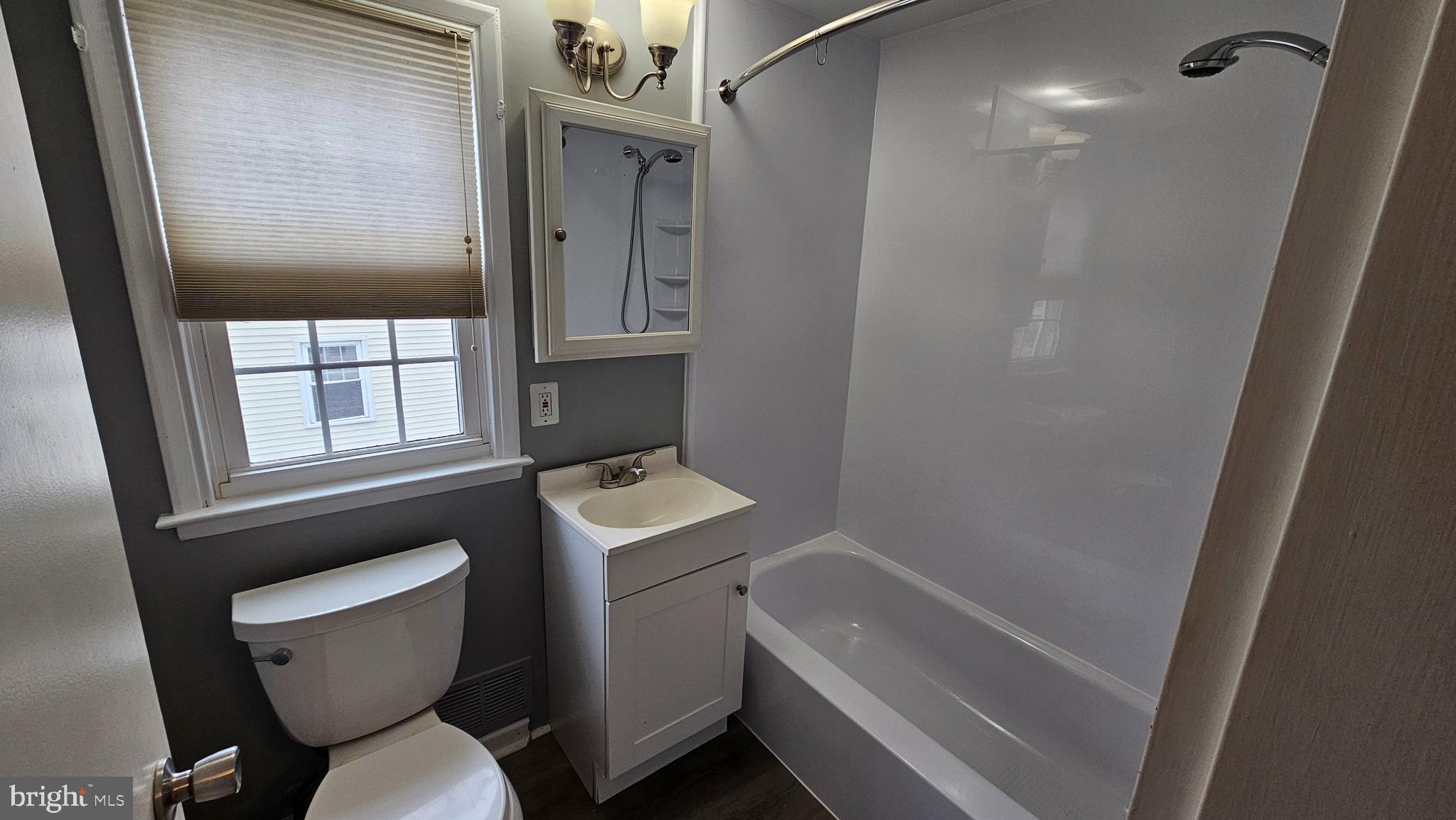 321 Ardmore Road Linthicum Heights, MD 21090 - Photo 18 of 24 a bathroom with a toilet sink and tub