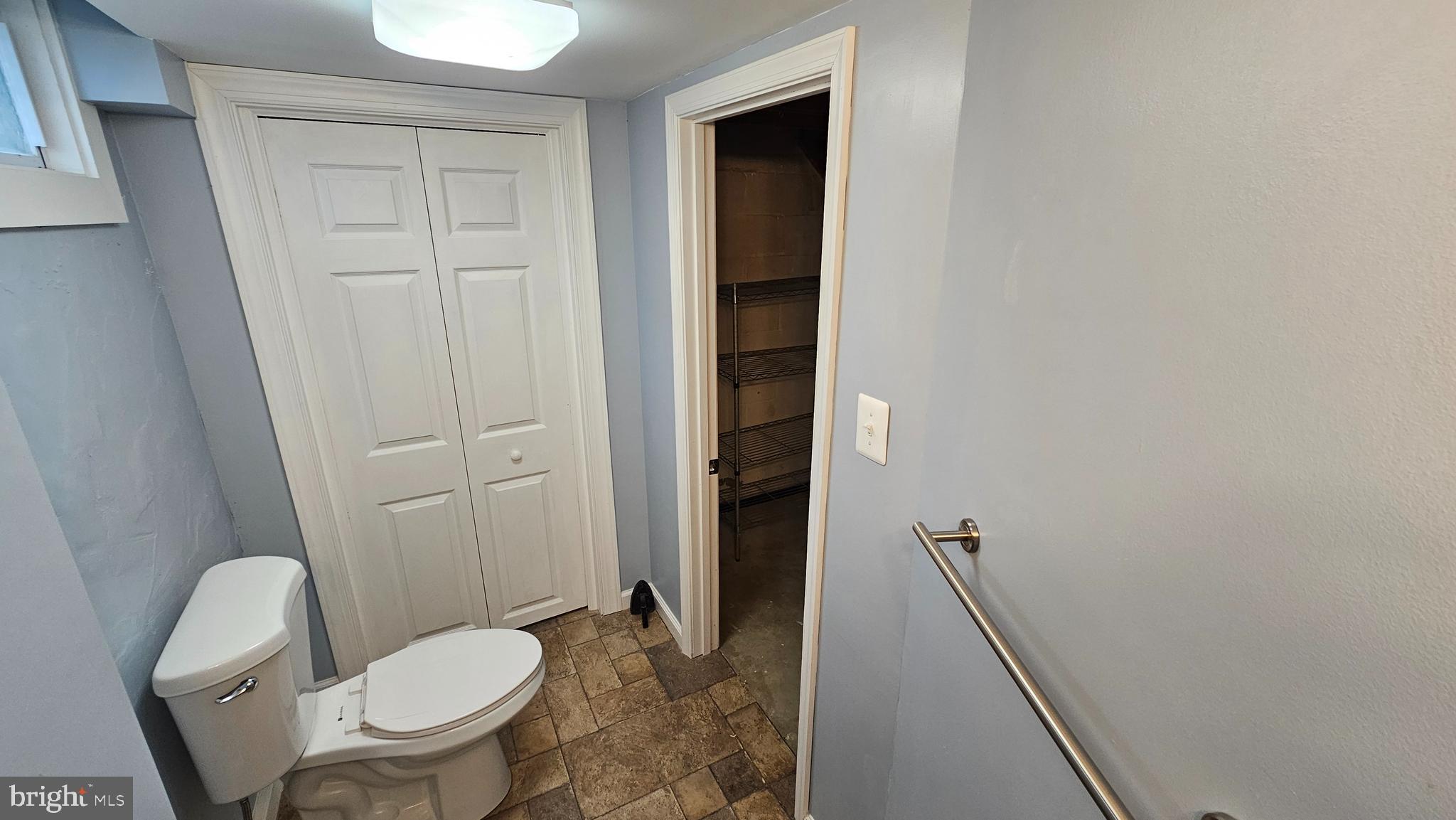 321 Ardmore Road Linthicum Heights, MD 21090 - Photo 22 of 24 a bathroom with a toilet and a sink