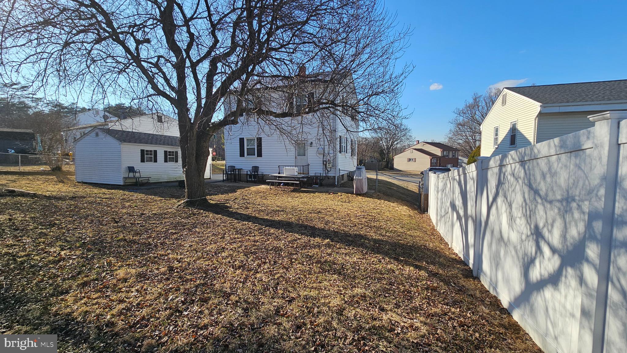 321 Ardmore Road Linthicum Heights, MD 21090 - Photo 4 of 24 a view of a yard with a house