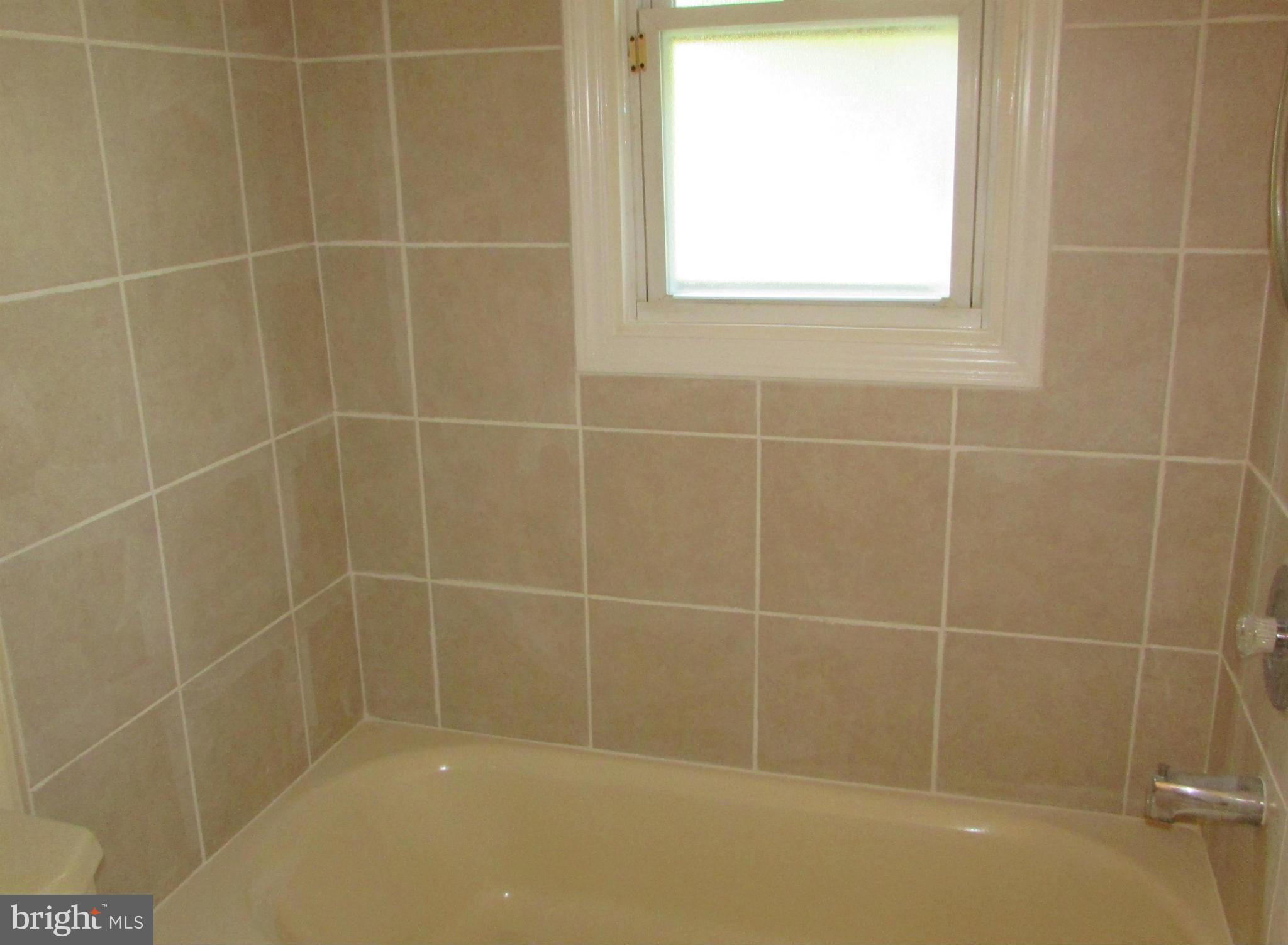 4804 Ridge Road Mount Airy, MD 21771 - Photo 17 of 25 Ceramic tile walls in Full bath