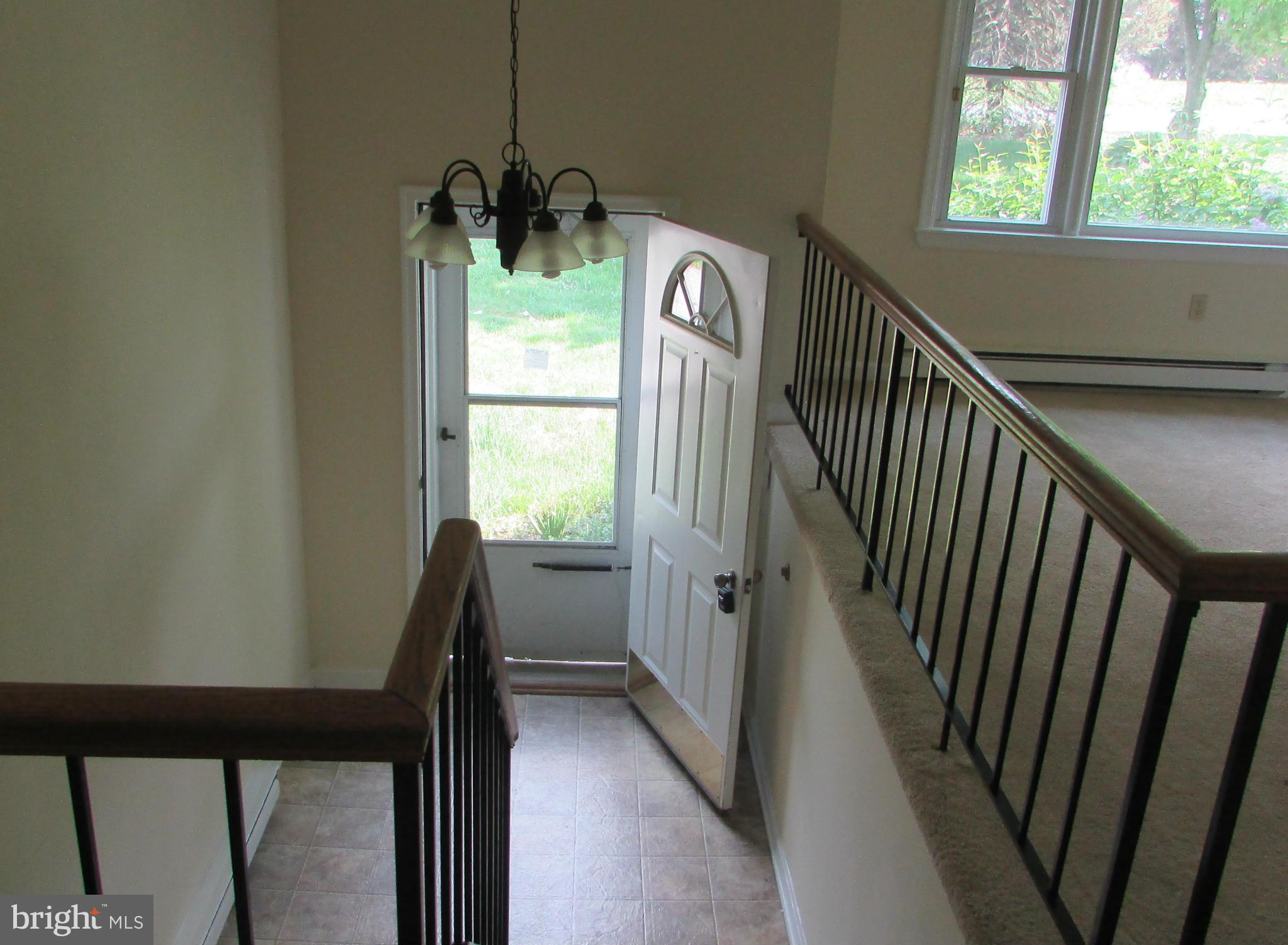 4804 Ridge Road Mount Airy, MD 21771 - Photo 20 of 25 Main level down to entrance foyer